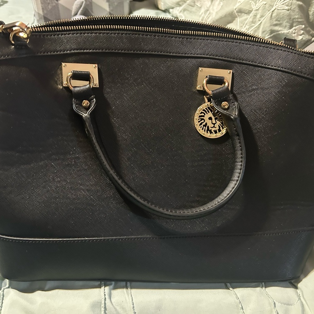 Elegant Black Satchel with Gold Details